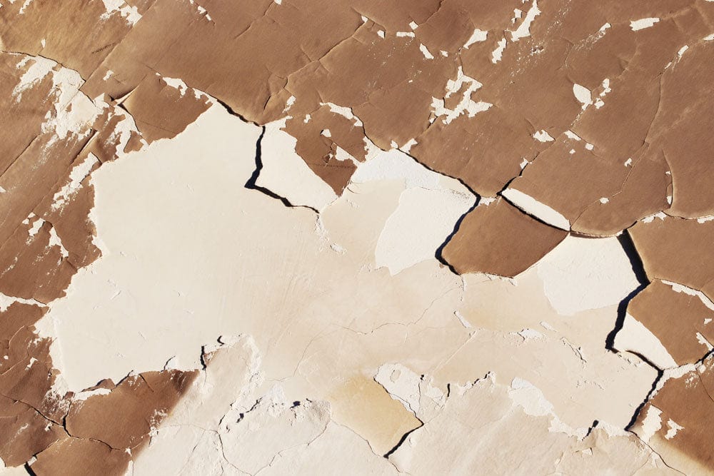 Cracked Earth Texture Mural Wallpaper in Natural Brown and Cream Tones