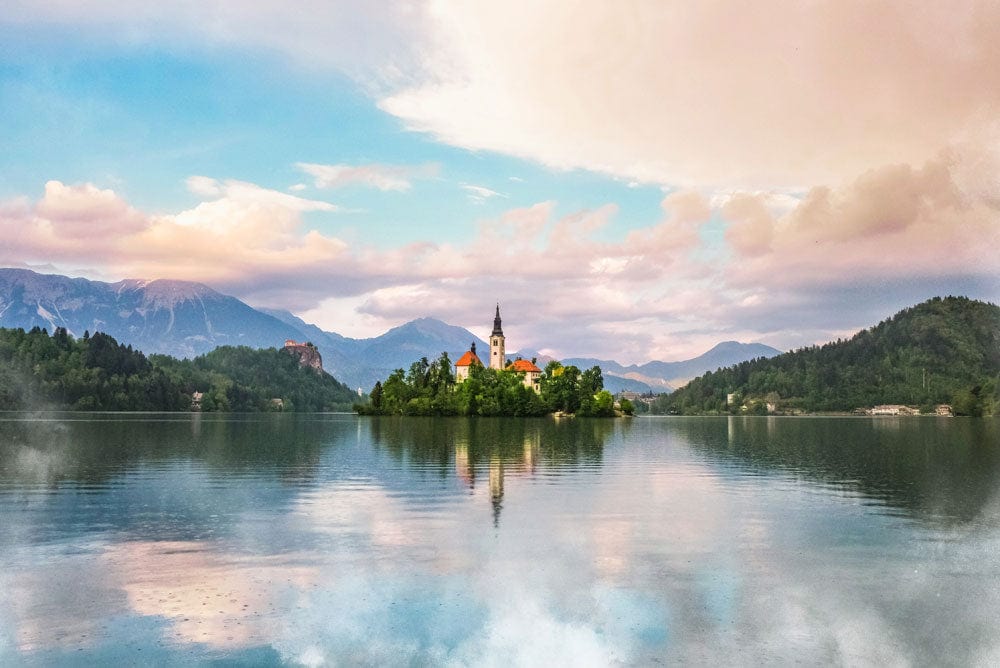 Tranquil Mountain Lake Landscape Mural Wallpaper with Serene Sunset Hues