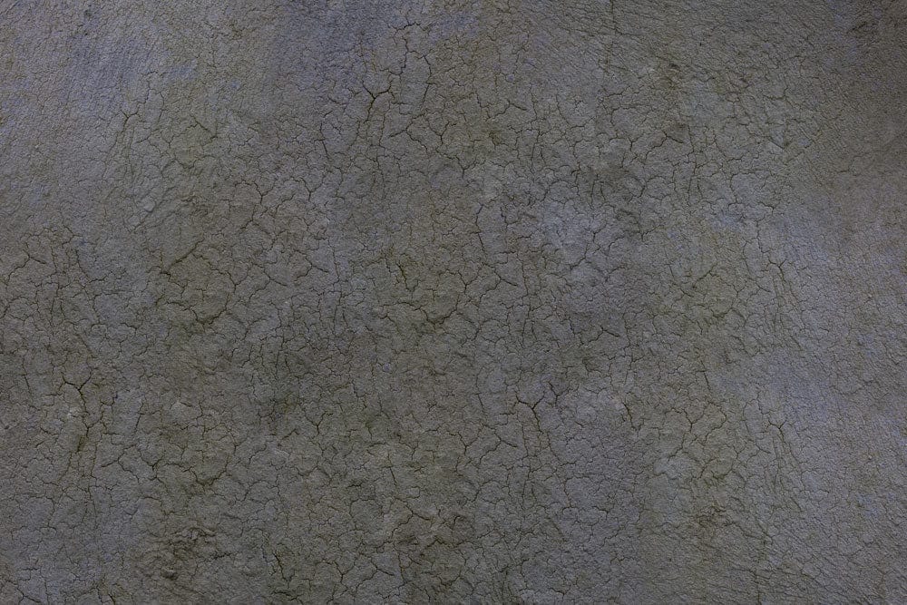 Textured Cracked Earth Effect Wallpaper in Grey for Rustic Interiors