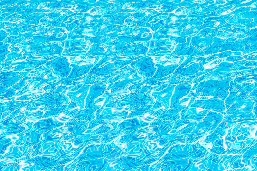 Vivid Aqua Blue Water Ripple Wallpaper for Modern Coastal Interiors