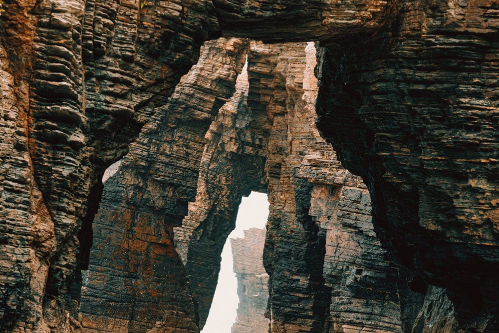 Rustic Rock Formation Mural Wallpaper - Natural Cliff Arches Design