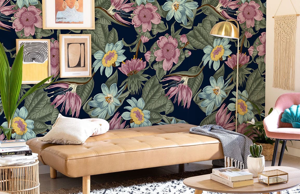 Luxurious navy floral wallpaper in botanical pattern, pink accents, tan sofa, cosy living room decor.