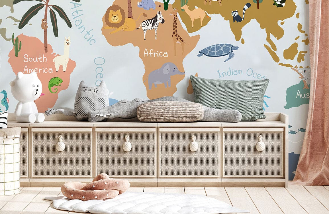 Whimsical World Map Mural Wallpaper in kids' room with wooden bench, soft toys, and light floor.