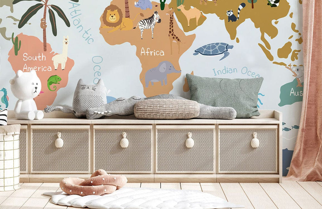 Whimsical World Map Mural Wallpaper in kids' room with wooden bench, soft toys, and light floor.