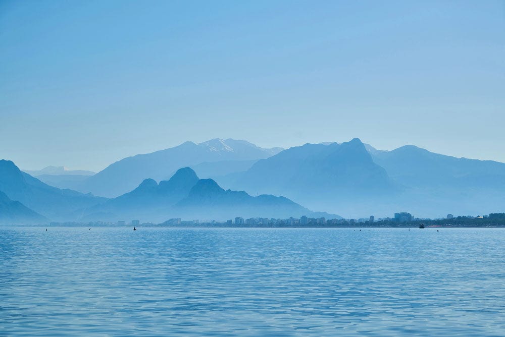 Tranquil Blue Mountain and Sea Vista Mural Wallpaper for Interiors