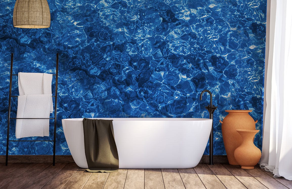 Deep Blue Ocean Ripple Effect Wallpaper in bathroom with freestanding tub, wooden flooring, and elegant decor.