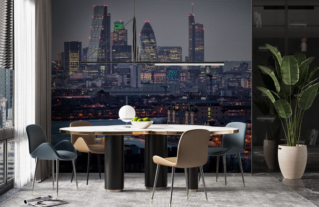 London Skyline Evening Mural in dining room with modern chairs, round table, and large potted plant.