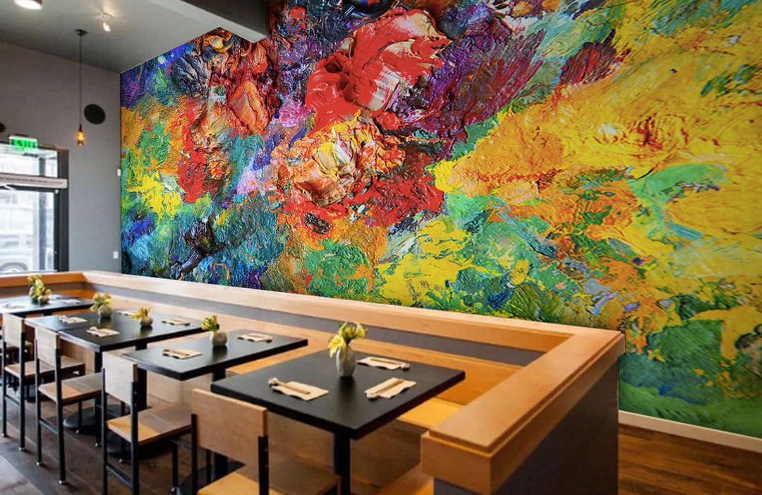 Vibrant abstract mural wallpaper in café with wooden tables, grey walls, and contemporary seating arrangement.