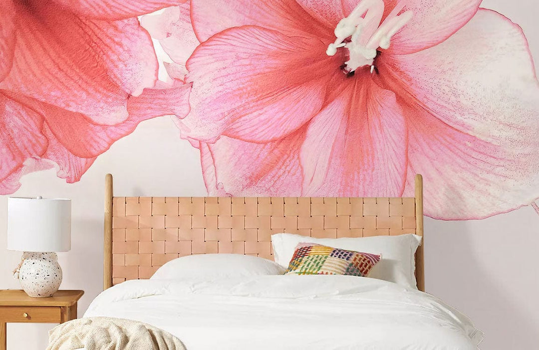 Elegant Pink Floral Blossom wall mural, contemporary bedroom setting, wicker headboard, white bedding, bedside lamp.