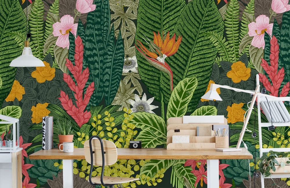 Tropical Paradise Botanical Mural Wallpaper enhancing a study with vibrant greenery, wooden desk, modern chair.