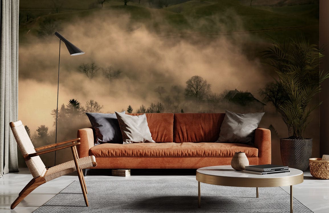Tranquil misty woodland mural wallpaper with earthy tones, featuring a brown sofa, and wooden flooring.