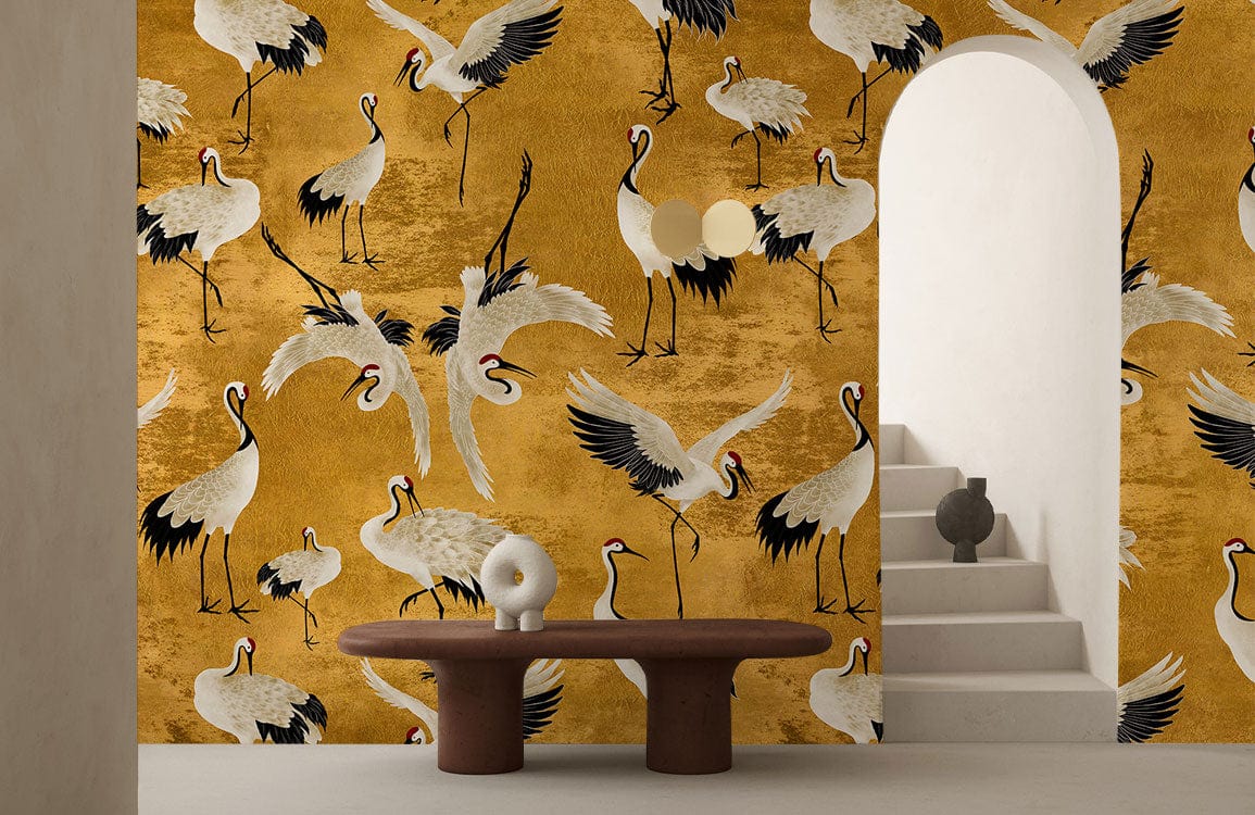 Elegant golden crane wallpaper in room with beige steps, minimalist table, and white decorative vase.