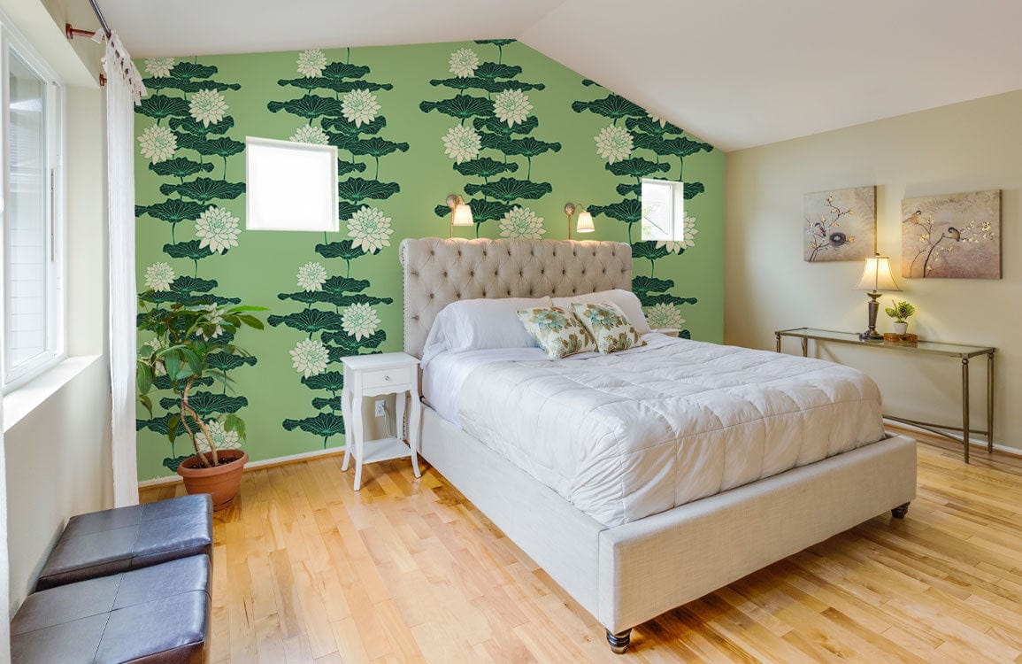 Green floral nature-inspired wallpaper in elegant bedroom with beige bed, wood flooring, and modern decor.