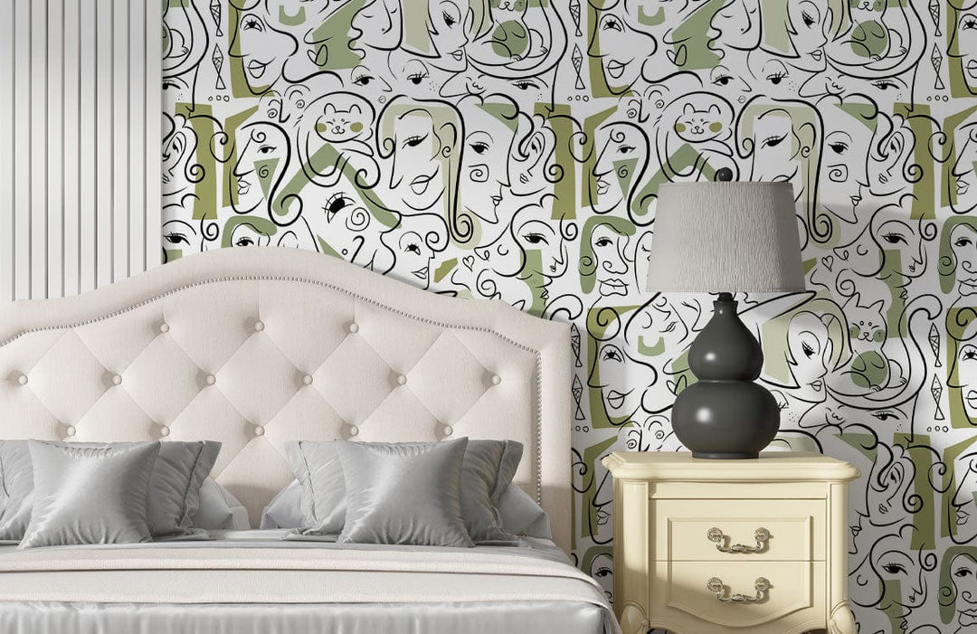 Elegant bedroom with abstract green and white line art wallpaper, tufted headboard, and vintage bedside table.