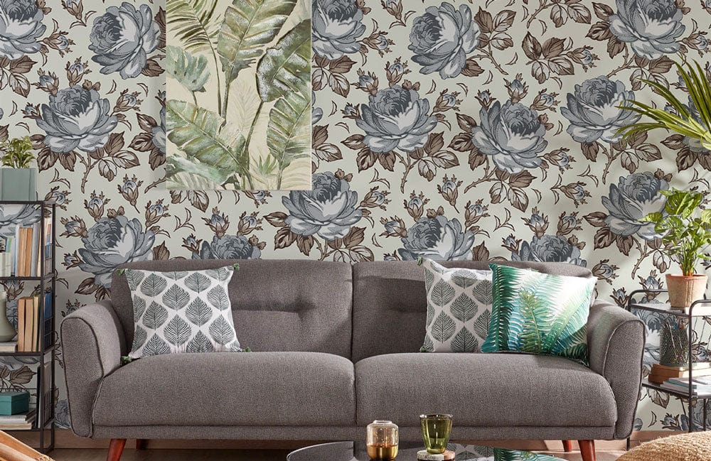 Vintage floral blue and brown wallpaper with elegant roses and grey sofa in stylish living room.
