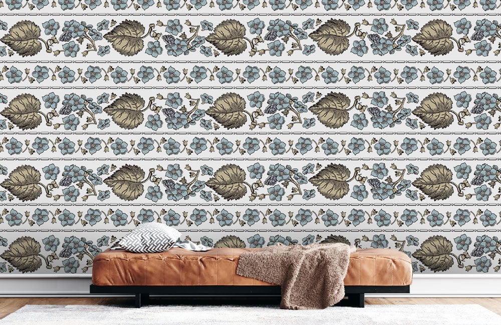 Vintage floral wallpaper with blue and olive leaves, brown leather sofa, contemporary white rug flooring.