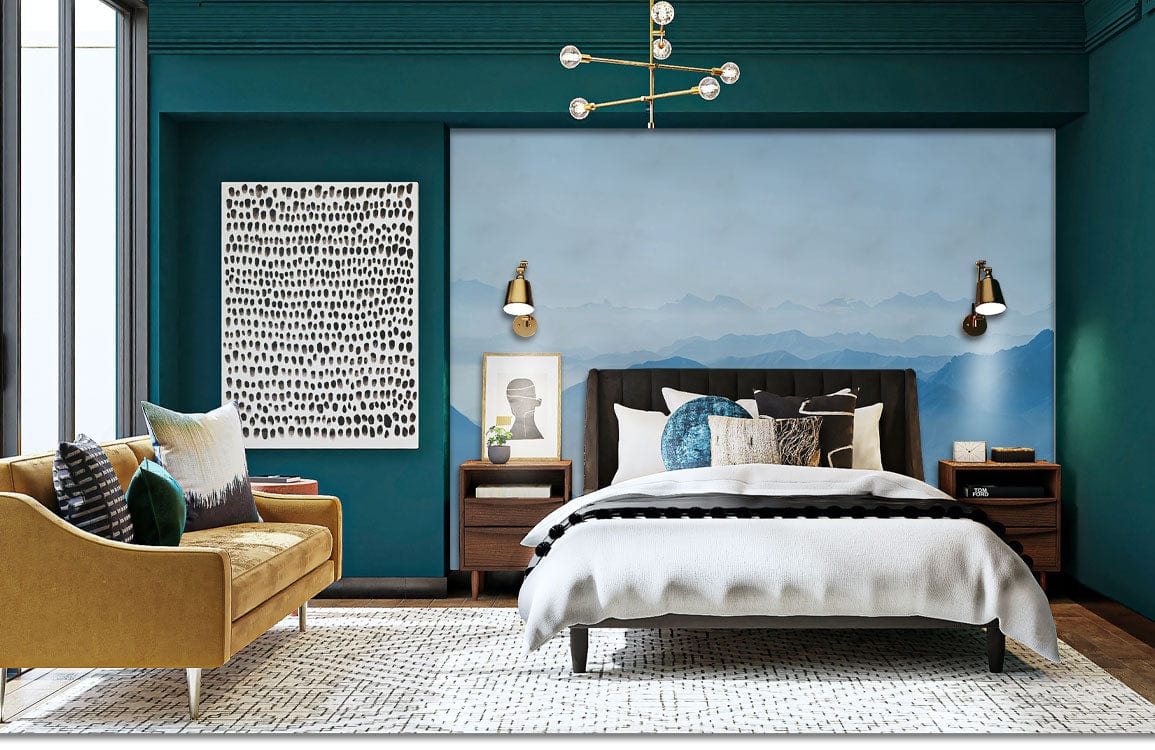 Tranquil Blue Mountain Range Scenic Mural Wallpaper in teal bedroom with mustard sofa and wood flooring.