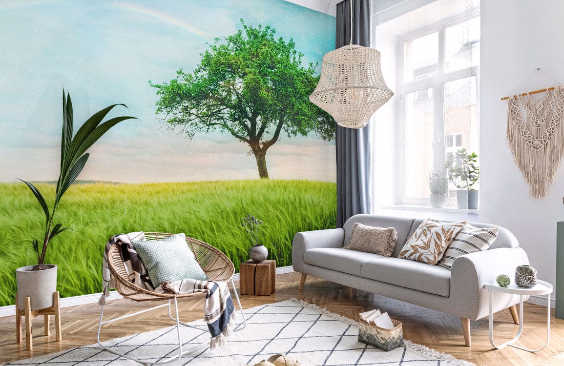 Tranquil Green Meadow mural wallpaper, grey sofa, wicker chair, light wood floor, bright living room.