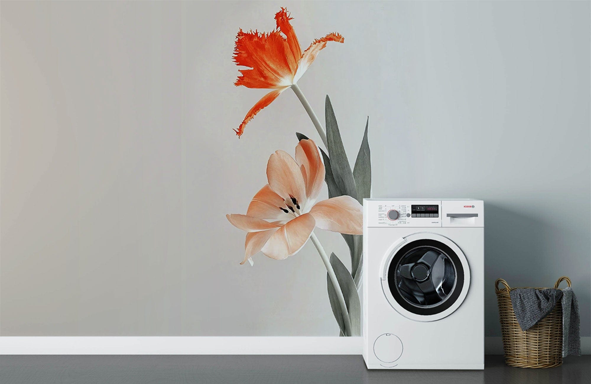 Elegant orange tulip floral mural wallpaper in laundry room with modern grey walls and washing machine.