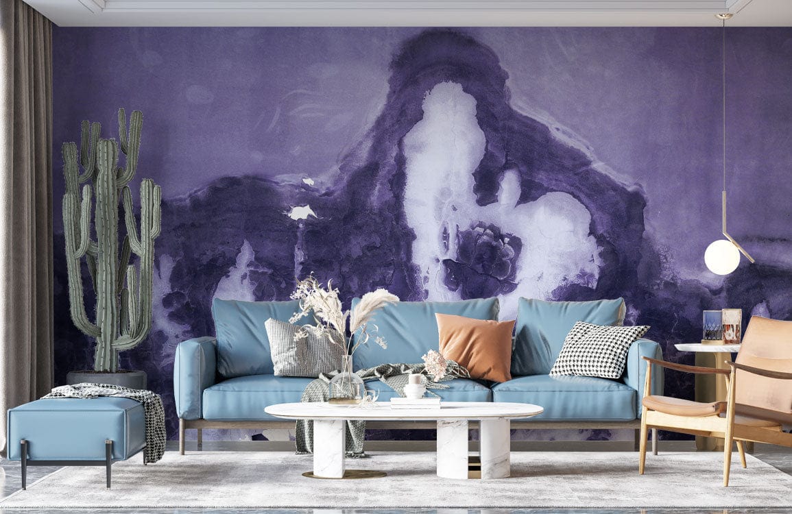 Purple abstract wall mural in living room with textured watercolour design, blue sofa, and wooden chairs.