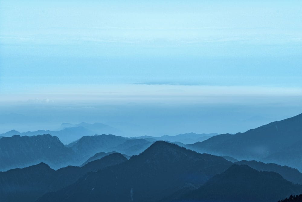 Tranquil Blue Mountain Landscape Mural Wallpaper for Serene Home Decor