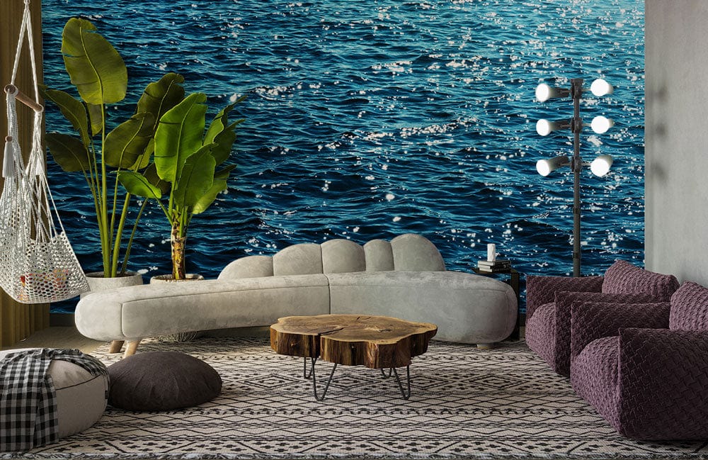 Tranquil Ocean Blue Ripple Pattern Wallpaper, grey sofa, purple chairs, serene living room decor.