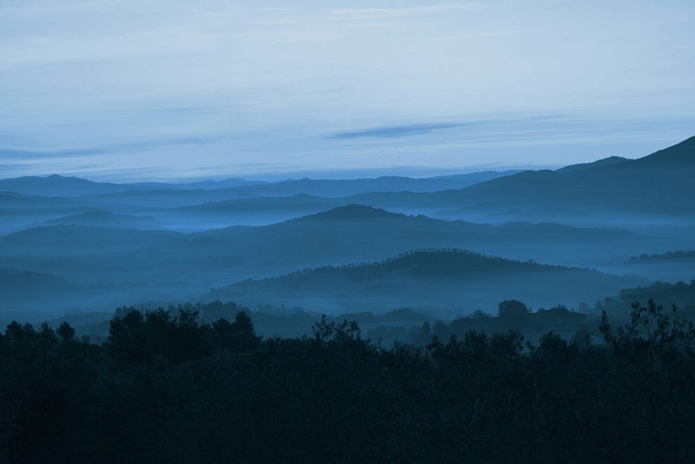 Tranquil Blue Misty Mountains Landscape Mural Wallpaper for Serene Decor