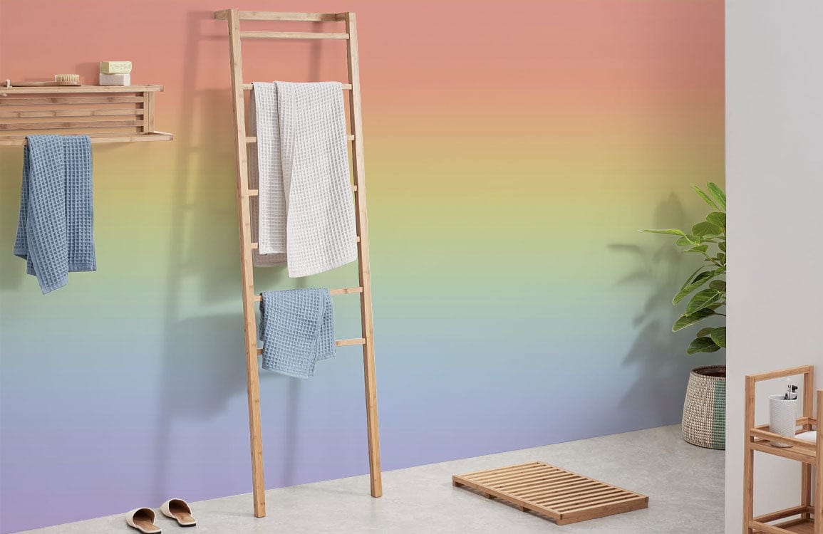 Pastel Rainbow Gradient Wallpaper in bathroom with wooden ladder, grey flooring, and minimal decor.