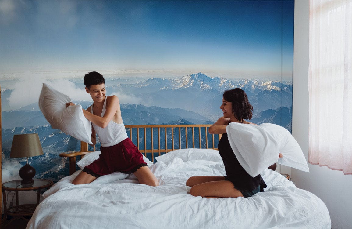 Wallpaper mural depicting a mountainous landscape, ideal for use as bedroom decor.