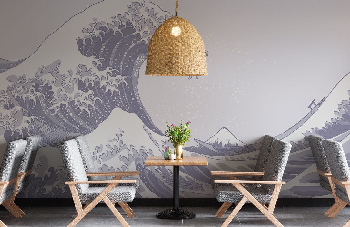 Elegant Indigo Great Wave Mural wallpaper in dining area with grey chairs, wooden table, rattan lamp.