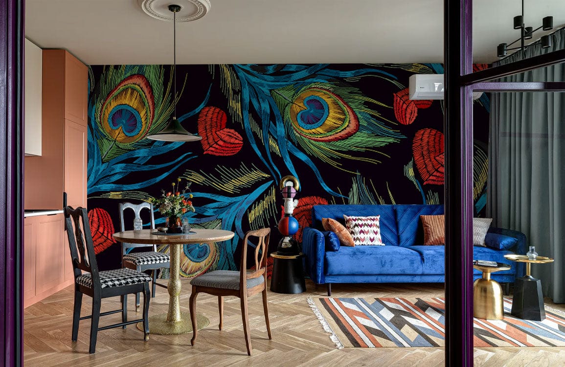 Vibrant Peacock Feather wallpaper in living room with blue sofa, patterned rug, wooden flooring, eclectic chairs.