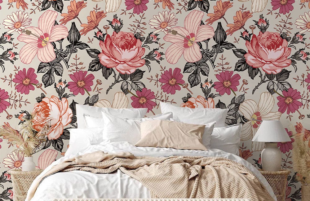 Vintage floral rose wallpaper in bedroom with cream bedding, neutral lamps, and woven bed frame.