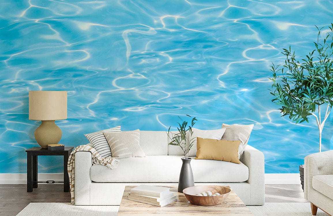 Serene Aqua Ripple wallpaper in living room with cream sofa, light wood flooring, and neutral decor.