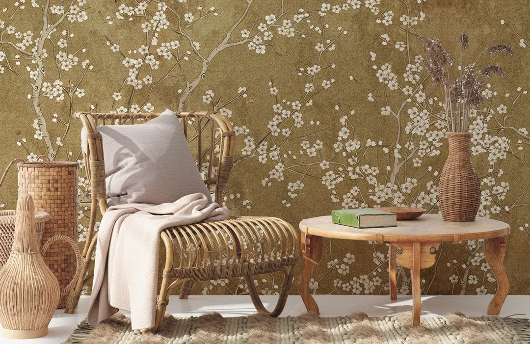 Vintage Blossom Mural wallpaper, cream floral on textured background, wicker chair, rustic coffee table, rug.