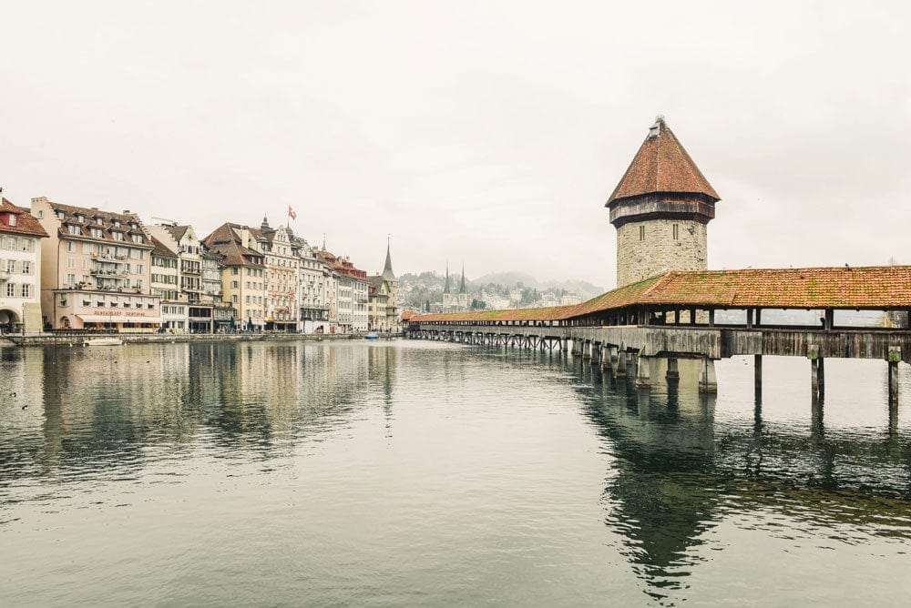 Vintage European Lakeside Architecture Mural Wallpaper in Soft Neutrals and Earthy Tones