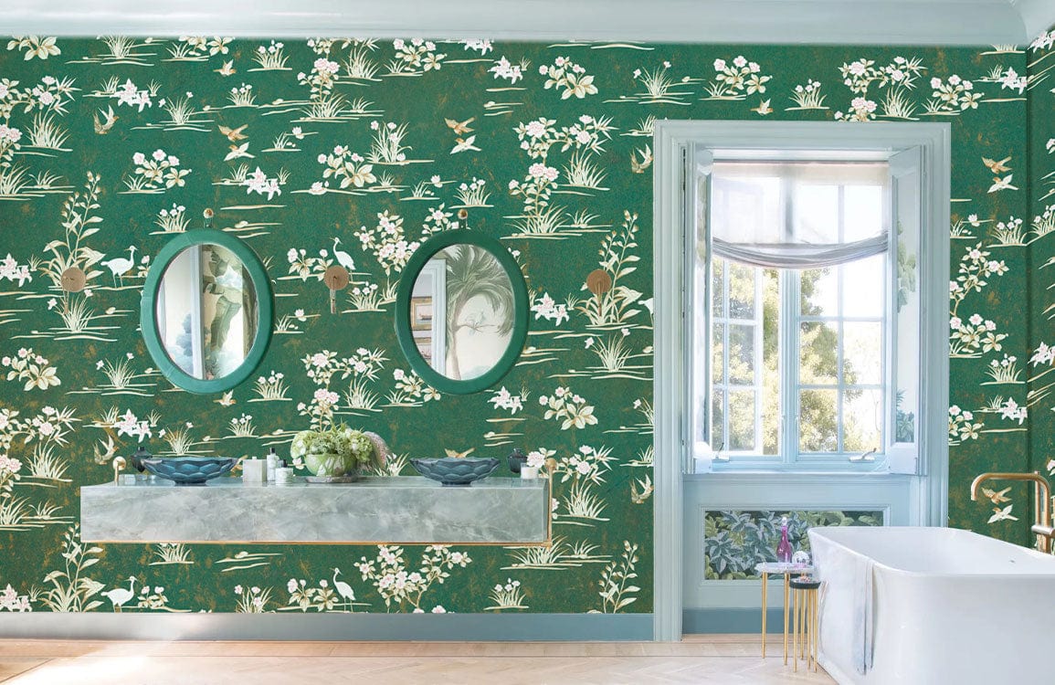 Vintage Green Floral Serenity Wallpaper in bathroom, featuring two mirrors, floating vanity, white bathtub.