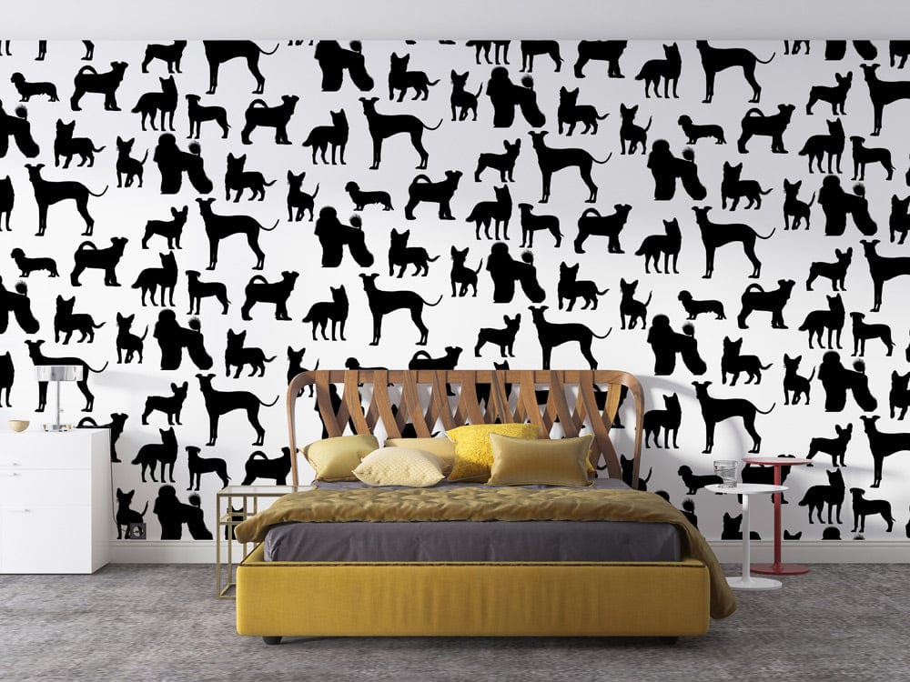 Monochrome canine silhouette wallpaper in stylish black and white design with mustard bed in bedroom.