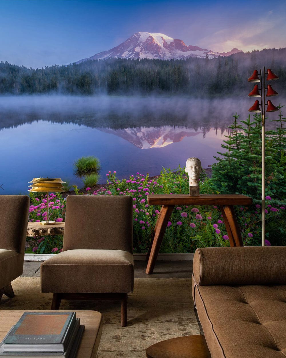 Tranquil Mountain Lake Mist Mural Wallpaper, brown mid-century chairs, brown sofa, modern living room decor.