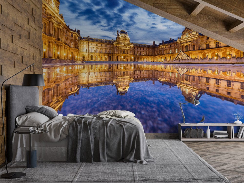 Majestic Paris mural wallpaper, blue and gold, grey bed, wooden accent wall, modern loft bedroom.
