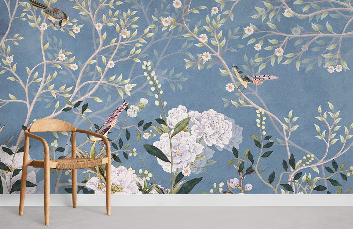 Elegant nature-inspired wallpaper with blue floral bird design and wooden chair; serene room setting.