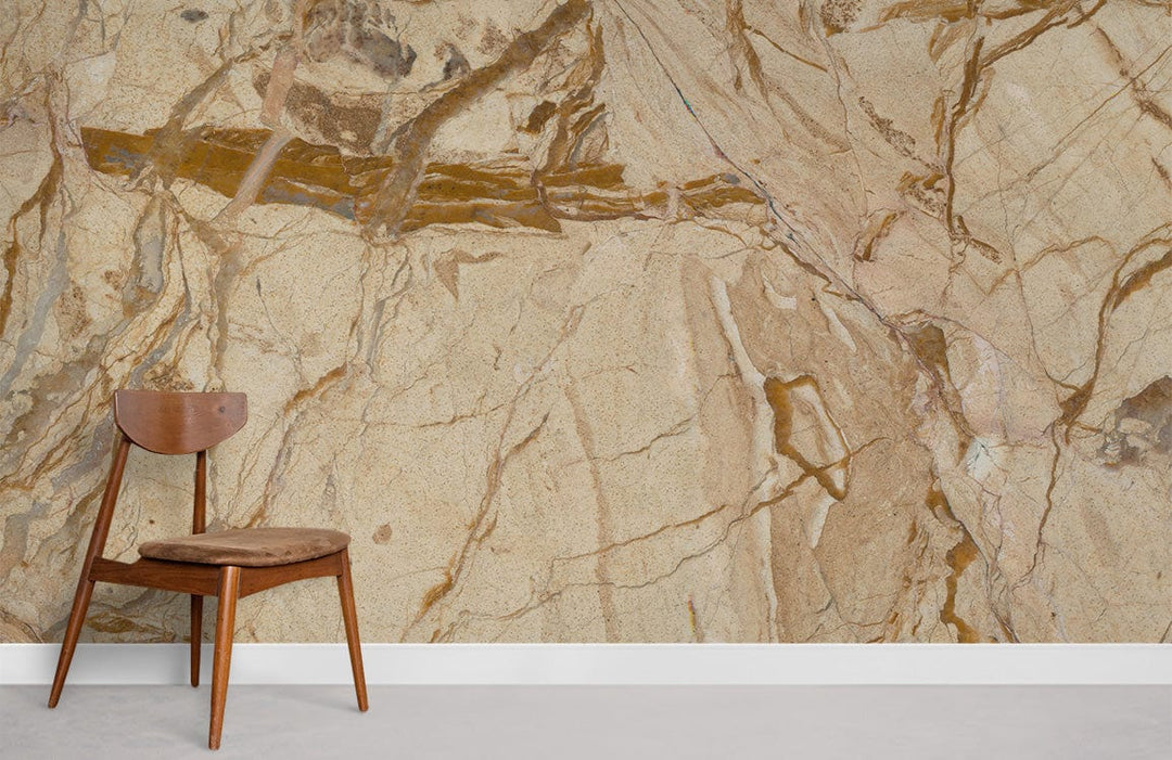 Gold marble mural wallpaper in elegant room with wooden chair, minimalist design, grey flooring.