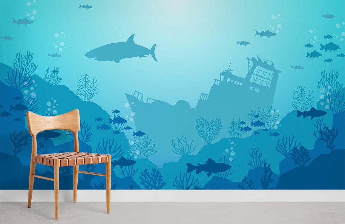 Underwater mural wallpaper with shipwreck design, wooden chair, blue marine theme, in bright room.