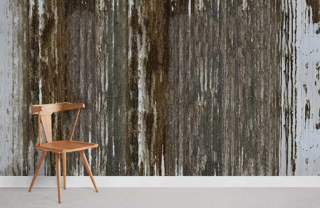 Rustic weathered wood-effect wallpaper in earthy brown, wooden chair, concrete flooring, minimalist room decor.