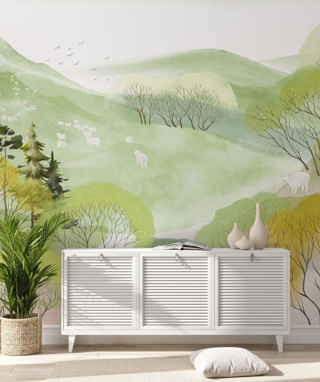 Serene Pastel Forest Landscape Mural Wallpaper with white cabinet, green nature scene, living room setting.