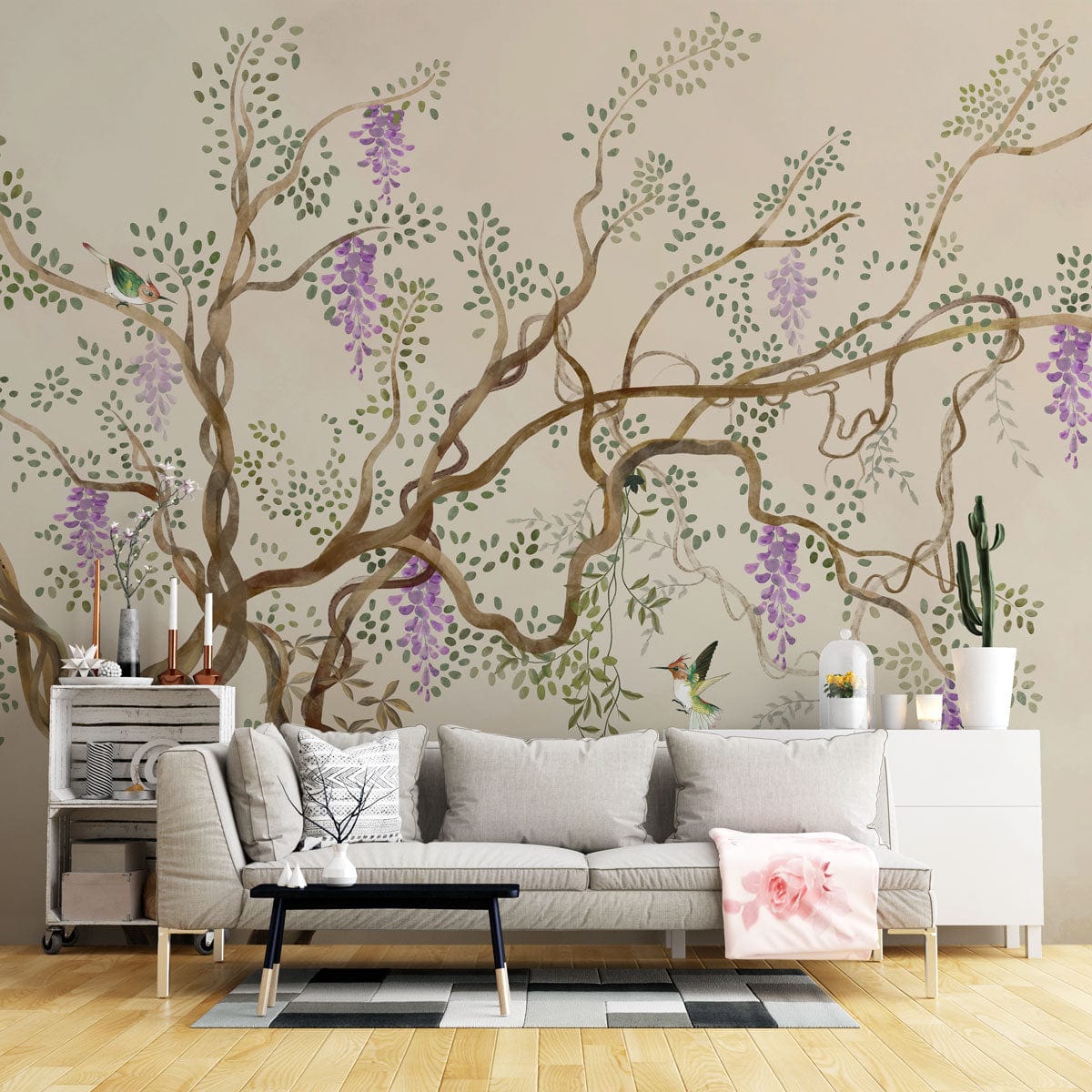 Vintage botanical wisteria mural wallpaper, soft earthy tones, birds, grey sofa, hardwood flooring, living room.