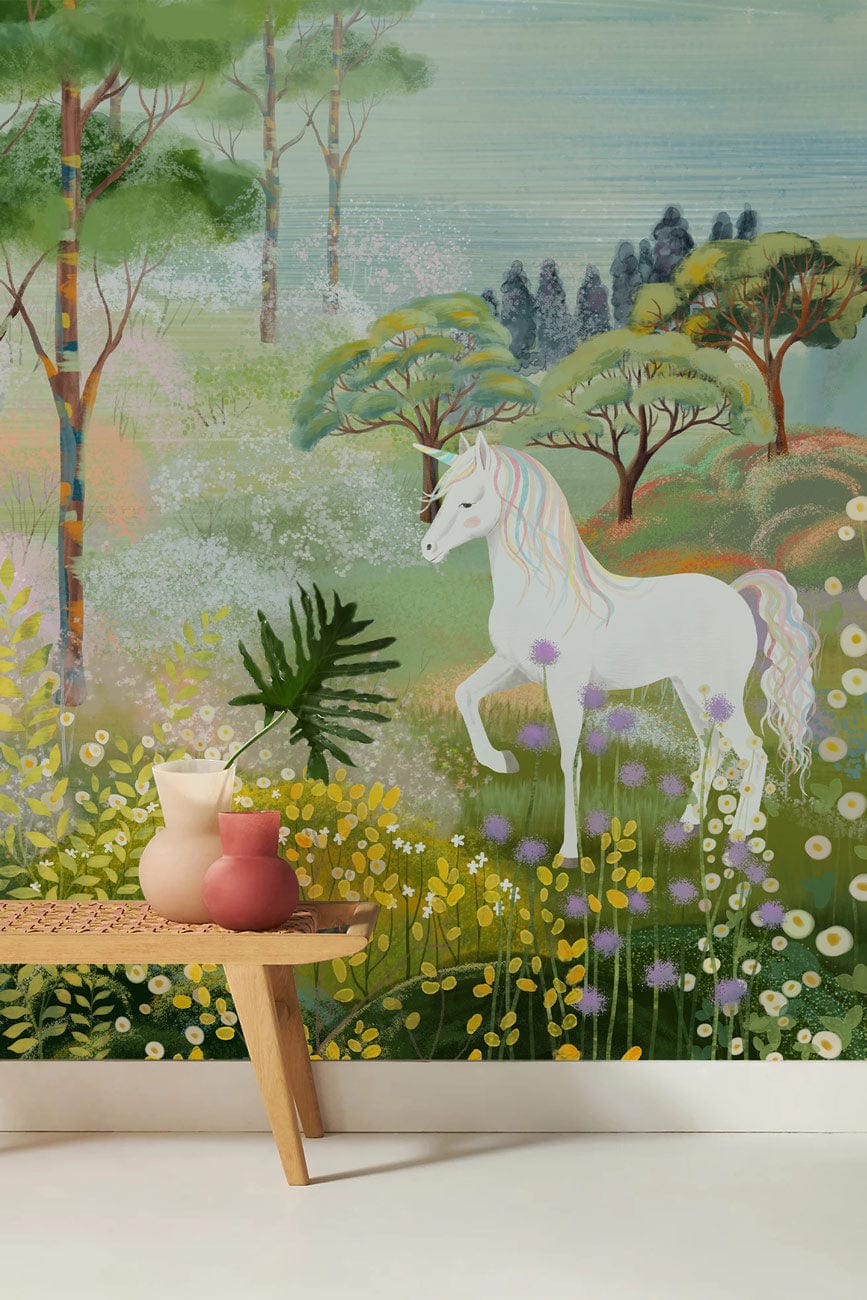 Enchanted Forest Unicorn Mural Wallpaper in pastel hues, wooden bench, for children's bedroom decor.
