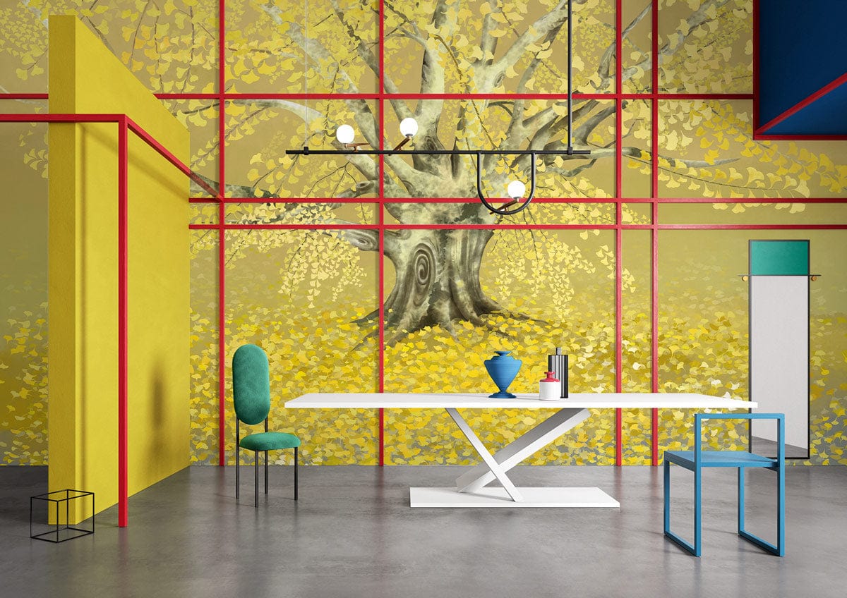 Yellow tree mural wallpaper, modern decor, artistic dining room, sleek white table, teal chair, grey flooring.