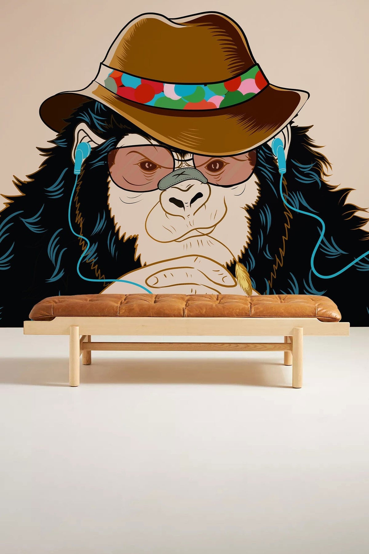 Chic Monkey Hipster Style Mural Wallpaper with Brown Hat, sunglasses, tan leather sofa, minimalist room.