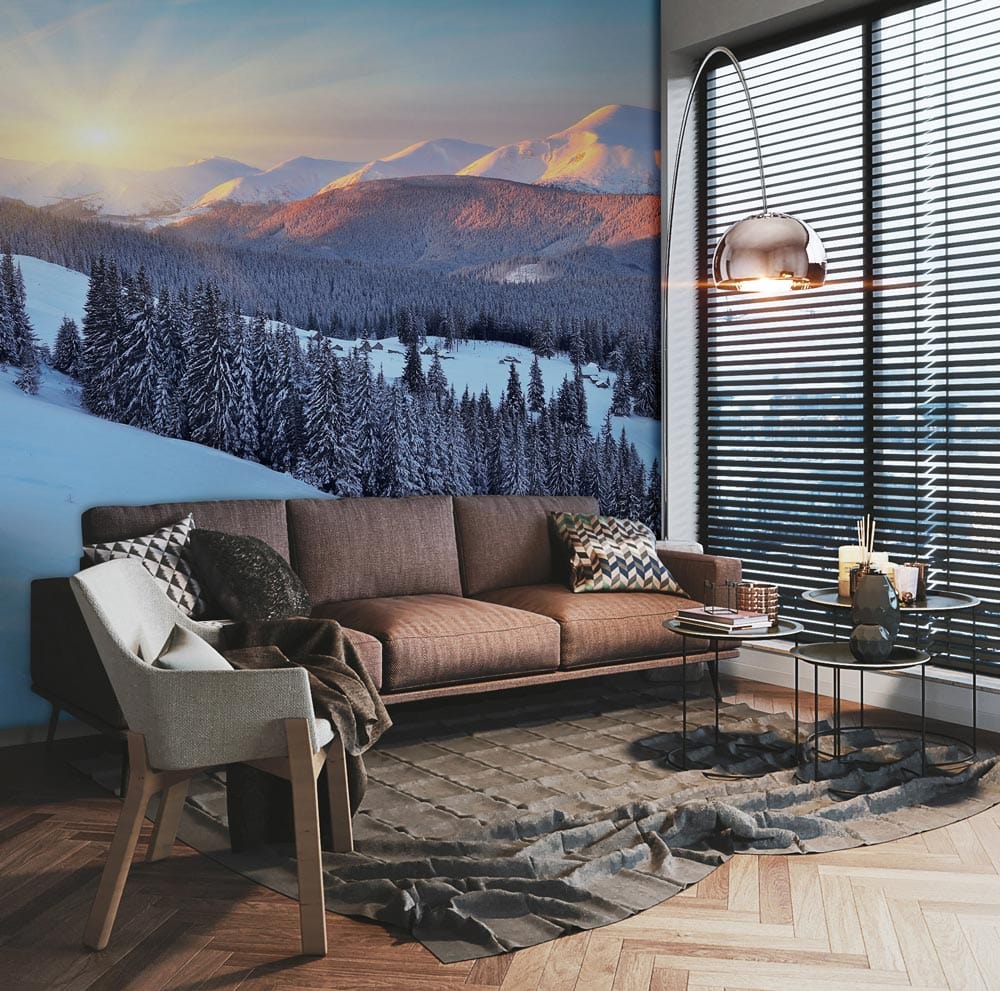 Tranquil Snowy Mountain Sunrise Mural, brown sofa, herringbone flooring, modern living room setting, winter decor.