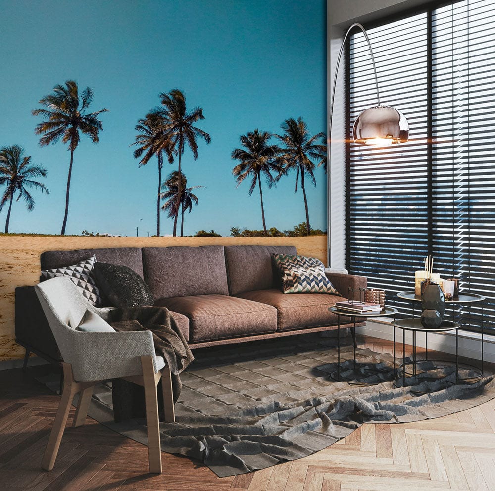 Tropical beach mural wallpaper, brown sofa, grey rug, wooden parquet flooring, modern living room design.